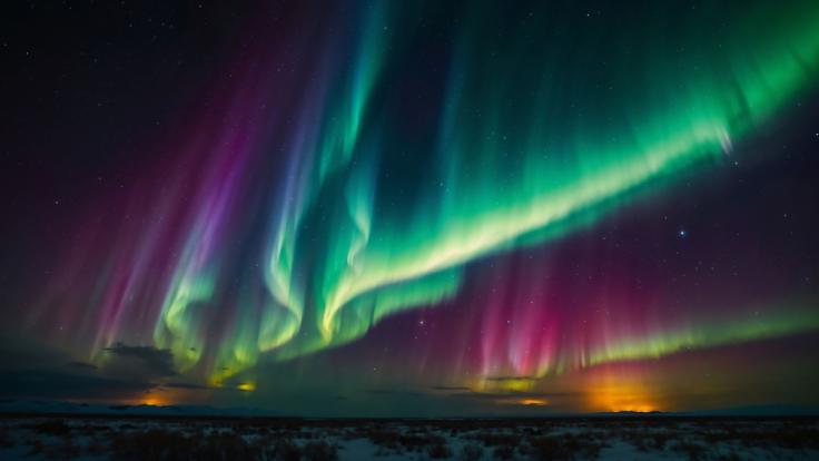 An Silvester könnten Polarlichter über Deutschland tanzen.