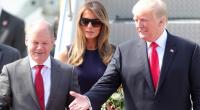 Das Archivfoto zeigt Olaf Scholz gemeinsam mit Donald Trump und dessen Ehefrau Melania.