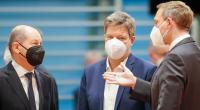 Olaf Scholz, Robert Habeck und Christian Lindner im Gespräch.