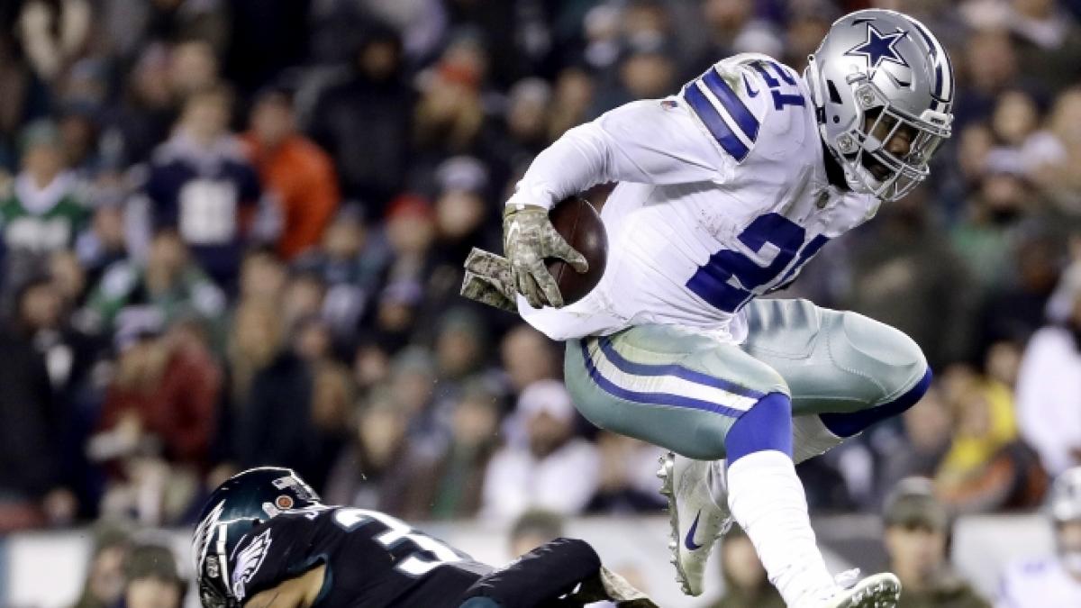Ezekiel Elliott springt &uuml;ber einen Spieler am 11.11.2018. (Symbolbild) (Foto)