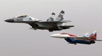 Ein russisches Kampfflugzeug vom Typ Suchoi SU-30SM - hier ein ähnliches Modell neben einer MIG-29 - kann je nach Ausstattung bis zu 93 Millionen US-Dollar wert sein.