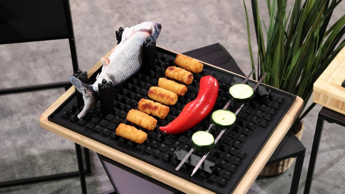 KitchBo l&auml;sst sich durch das Klicksystem vielseitig verwenden und verspricht gleichm&auml;&szlig;ig gegarte und knusprige Speisen. (Foto)