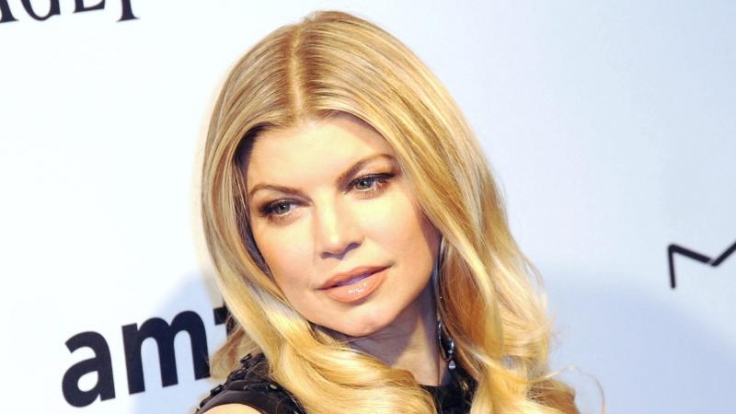 Zungenküsse für den Sohn: Fergie findet's total normal.