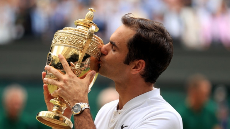 Roger Federer freut sich über seinen achten Titel-Gewinn in Wimbledon.