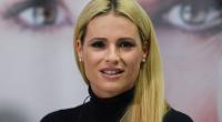 Michelle Hunziker lässt am Strand tief blicken.
