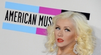 Auf Instagram bot Christina Aguilera ihren Fans eine Wet-T-Shirt-Show im nassen roten Kleid.